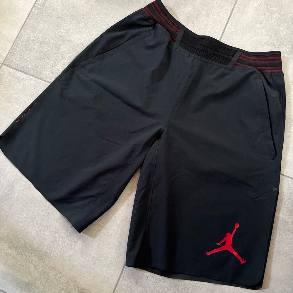 Jordan Basketball Shorts. Size Men’s Small- Black and Red with pocket zippers